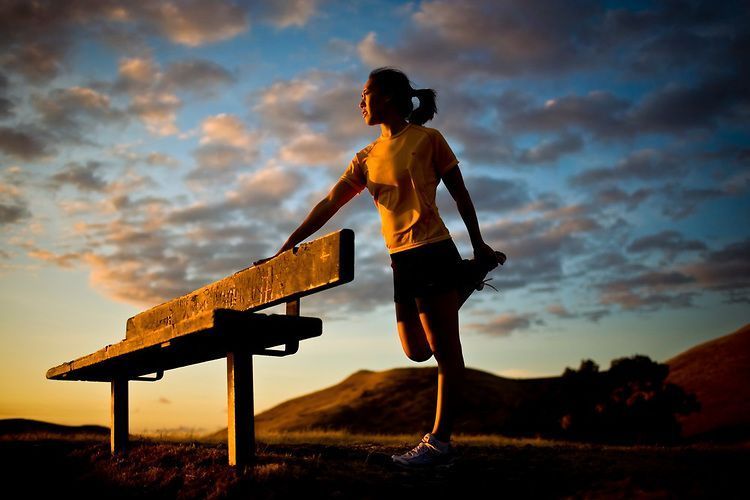 woman-stretching-runner